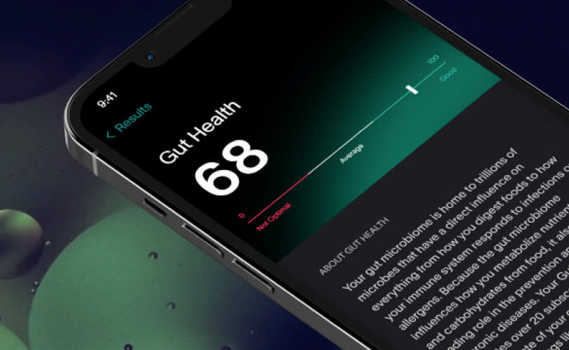 A black smartphone showing a Viome Gut Health Score of 68, with a description of what that score means below